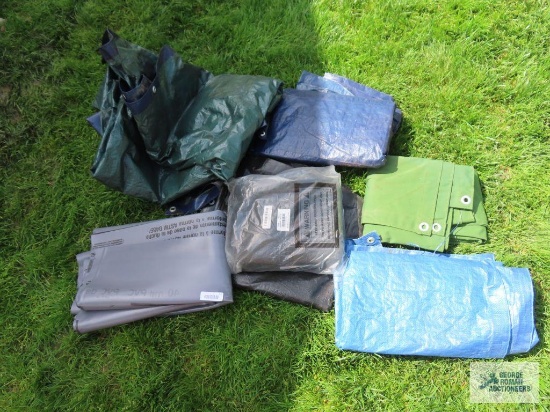 Assorted tarps and rubber piece