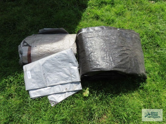 Gray and black tarps