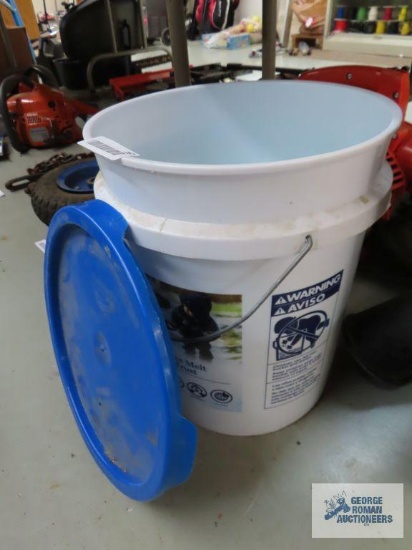 Bucket of ice melt. Bucket is half full.