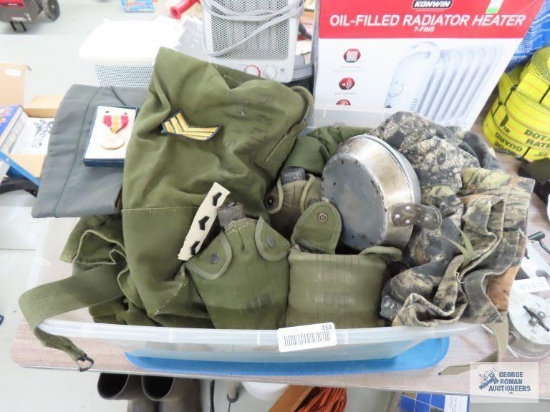 Mossy Oak hunting pants size large, canvas army bags, wool Army blanket, various army pins and