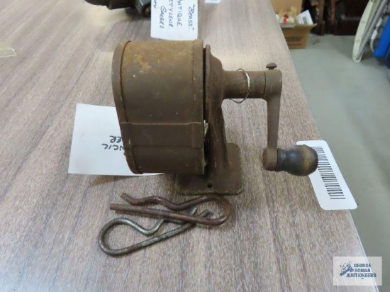 Antique pencil sharpener with pins