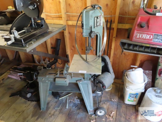 Enco Manufacturing metal cutting band saw model 137-3150 with extra blades. Located in back shed.