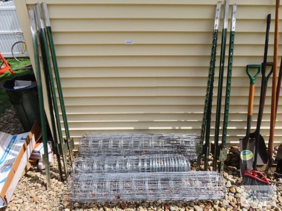 Rolls of fencing with fence posts