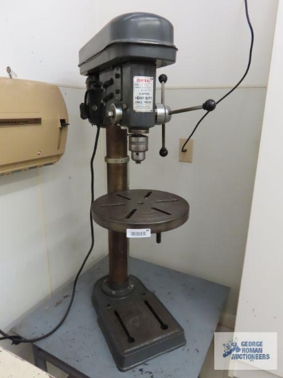 Central five speed heavy duty drill press with metal table. Model C112