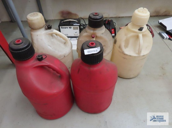 Lot of racing car gas cans