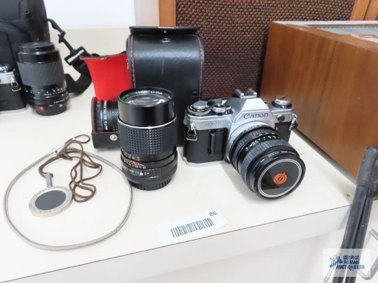 Camera AE1 camera with two extra lenses and lens cases