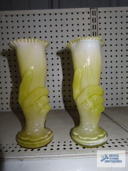 Pair of yellow glass hand held vases