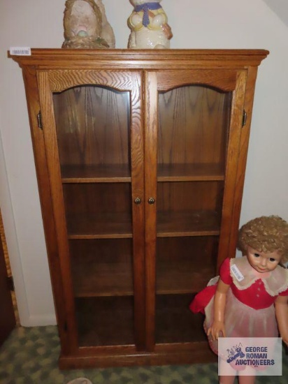 Oak glass front cabinet