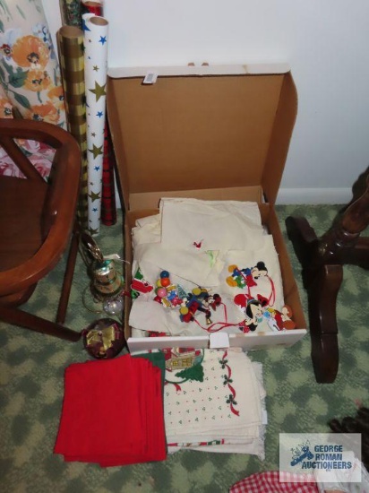 Christmas ornaments, mostly Mickey Mouse. Christmas towels and napkins.
