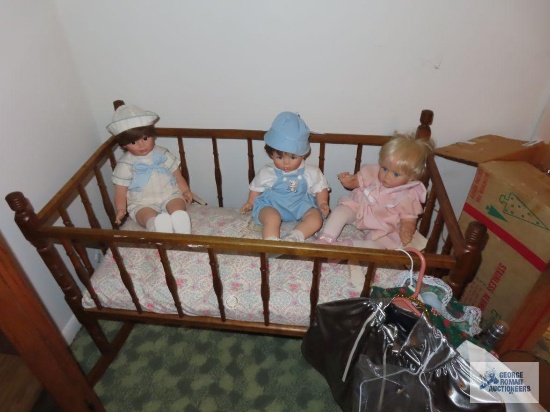Wood rocking bassinet with two Susan Wakeen Collection dolls and Original by Elaine doll