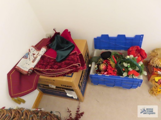 Christmas tree skirts and variety tote of Christmas decorations