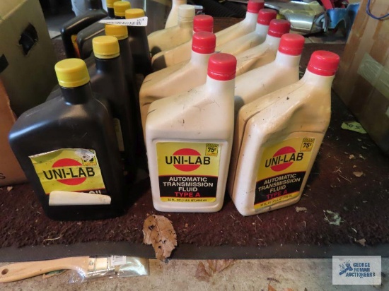 7 quarts of Uni-lab SAE HD-30 oil, 9 quarts of automatic transmission fluid type A and 1/4 of a