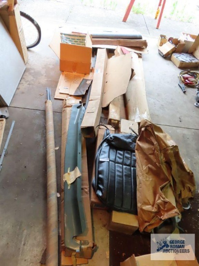 Large assortment of New Old Stock automotive parts including seat covers, body trim, sound dampener,