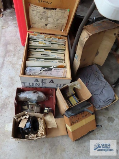 A.E.A. tune-up charts with wooden box, New Old Stock automotive parts and used automotive parts