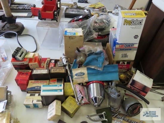 Assorted New Old Stock automotive parts and used automotive parts