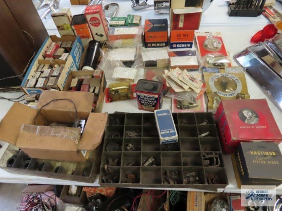 Assorted New Old Stock automotive parts and used automotive parts