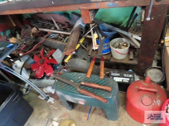 Hardware, automotive battery, automotive parts and etc under bench