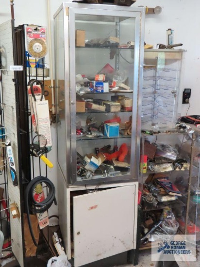 Display with assorted hardware and automotive parts