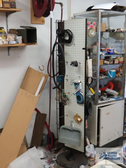 Display with assorted hardware and automotive parts