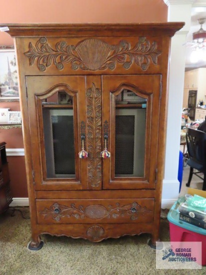 Lexington cherry entertainment cabinet with two movable shelves. Contents NOT included.