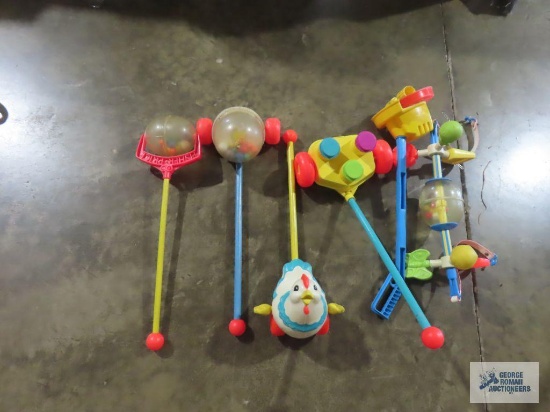 Fisher Price child's walk behind poppers