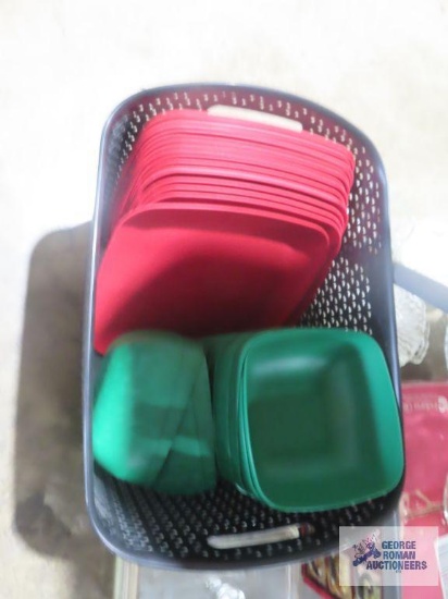 Mainstays red plastic plates and green bowls in plastic handled basket