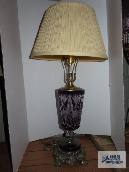 Purple and clear pressed glass lamp, approximately 31".