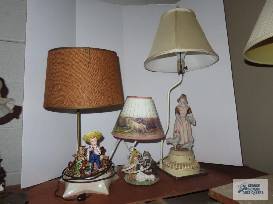 Two ceramic figurine base lamps. Resin dog figurine base lamp.