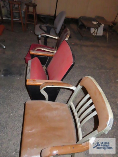 Theater seats and two industrial office chairs
