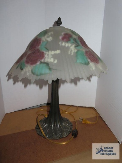 Metal base lamp with reverse painted shade by Goldie, lamp is approximately 19", shade is 9"x14".