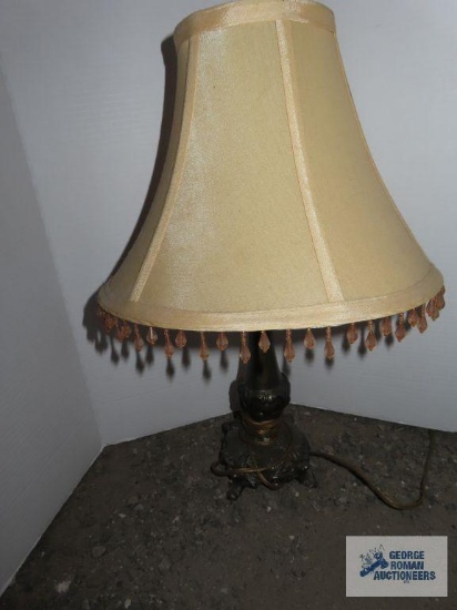 Metal base lamp with tan bead fringed shade, approximately 19".