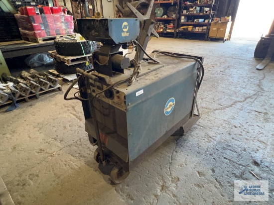 Miller Delta Weld 650 three-phase welder with model JJ-45 wire feeder and small amount of wire on