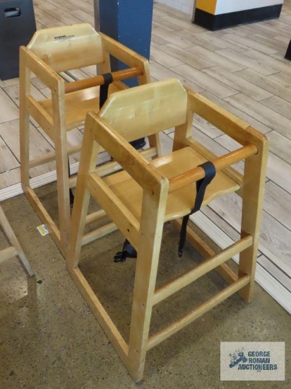 Two wooden high chairs