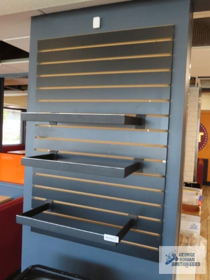 Two hanging displays with extra hardware