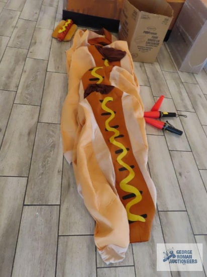 Hot dog costumes, one hot dog hat, and flashlights with red cones