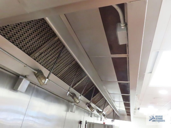 Stainless steel hood with fire suppression system. 22' x 4' 9". Buyer is responsible for removing