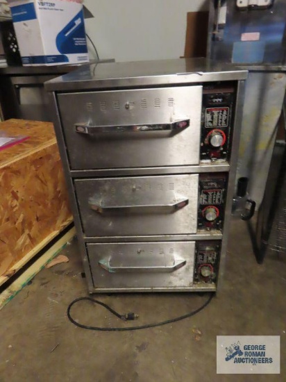 Hatco three drawer warmer. model HDW-3N. unit has dent in top right side.