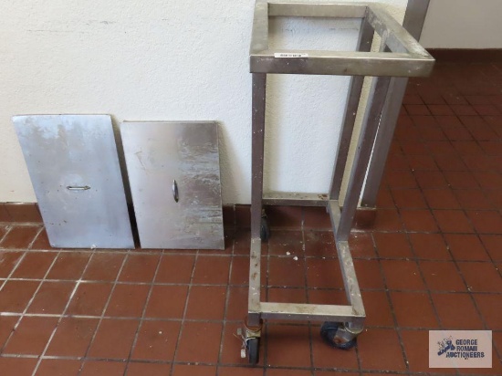 Roll about rack, missing wheel and stainless steel covers.