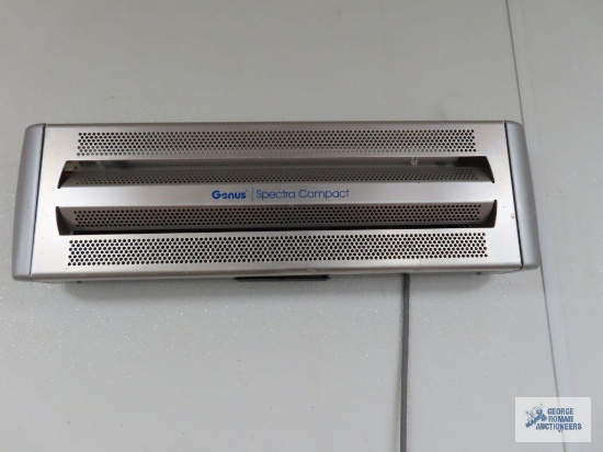 Two Genius Spectra compact commercial bug traps. Buyer to remove from wall.