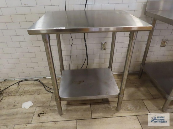 Stainless steel table. 2-1/2' x 2' x 35-3/4"