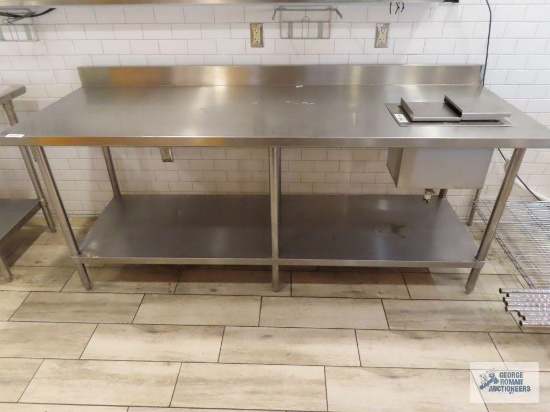 Regency stainless steel table with built-in sink. model number 600D11B1812. Table is 7' x 30" x 35".
