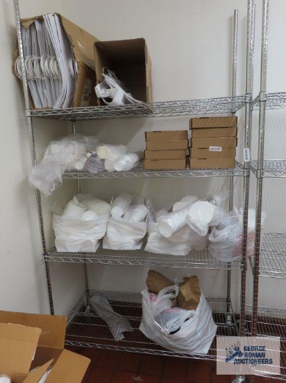 Stainless steel roll about adjustable rack made by Olympic Storage Products. 4' x 2' x 7' 8". Rack
