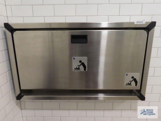 Stainless steel hanging diaper changing station. Bring torx bit set and regular bit set with