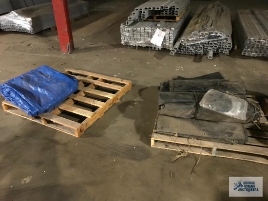 2 LARGE BLACK TARPS. 2 LARGE BLUE TARPS.