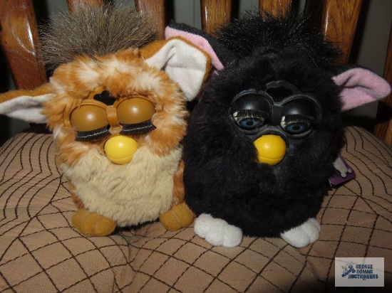 Two Furbies.