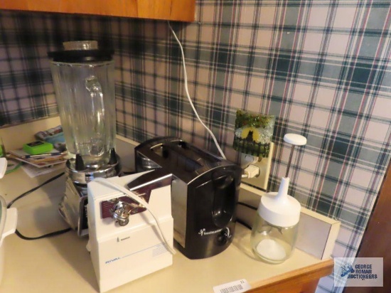 Toastmaster two slice toaster, Rival electric can opener, and Waring 14 speed blender.