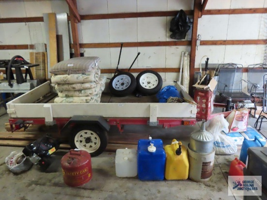 8' x 4' utility trailer with lights, ramps, and homemade sides. 2" ball Class 2 3500 lb hitch max