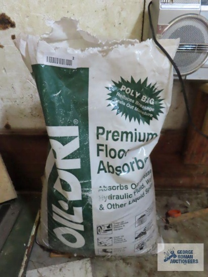 Partial bag of oil dri