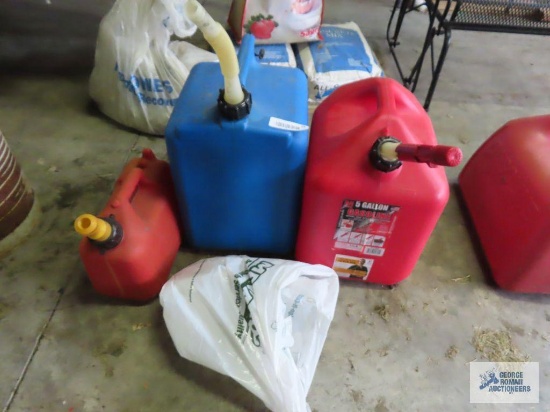 Kerosene can and gas cans.