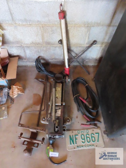 110 volt fluorescent work light, speed wrench, jumper cables, Ohio non-commercial license plate,